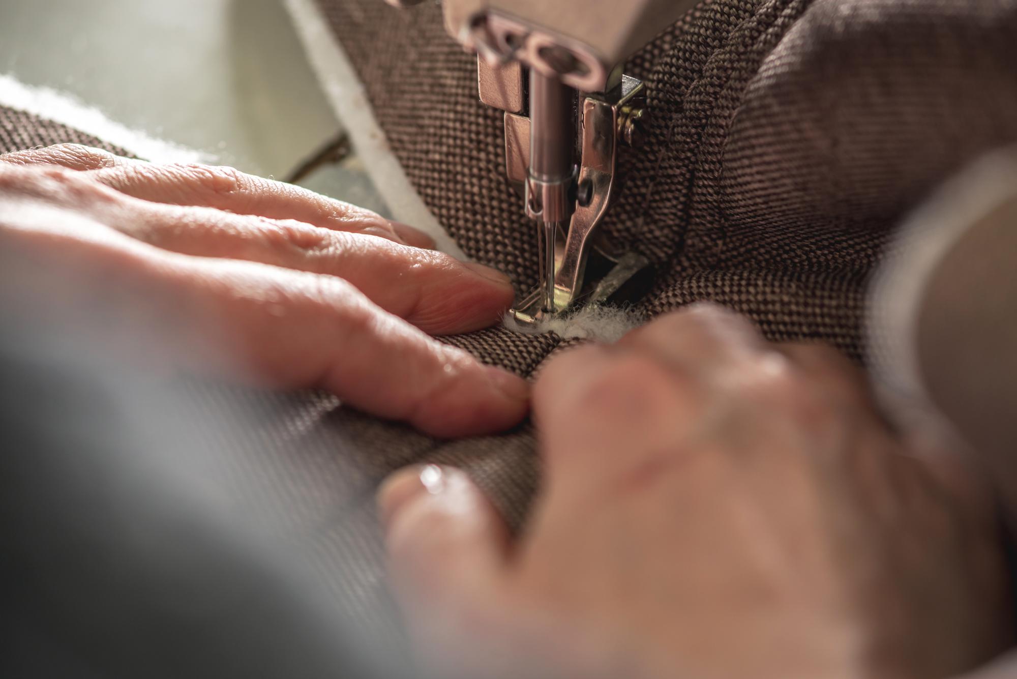 artisan stitching at work